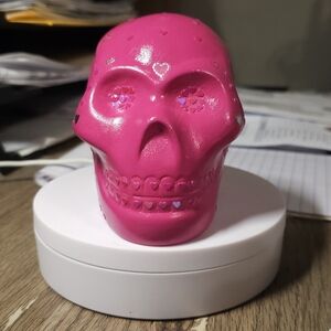 Vibrant Pink Skull with Heart Accents
